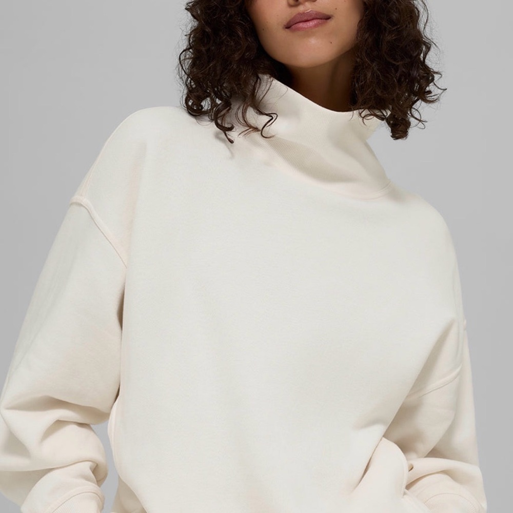 ALO Yoga Women’s Turtleneck Sweater in Light Rose